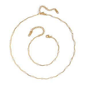 Minimalist 18K gold plated stainless steel necklace and bracelet set with wavy link design