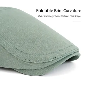 Classic men's green newsboy flat cap featuring high-quality twill fabric texture