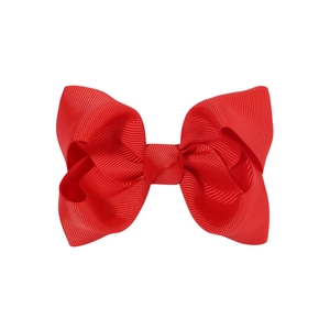 Close-up of a 4.13 inch red grosgrain ribbon bow hair clip with high-quality texture