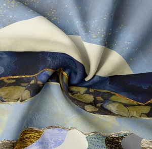 Detail of artistic tapestry fabric showing blue marble mountain texture and fine twill weave
