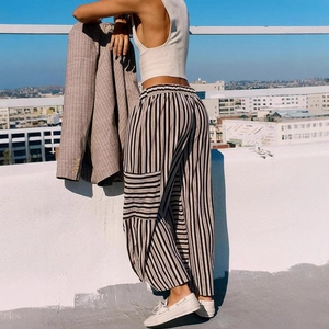Women's brown striped wide-leg trousers with loose fit and side pocket design