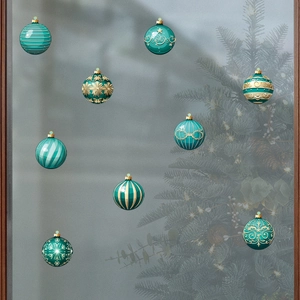 Christmas window stickers with festive cyan and gold ornaments and snowflakes designs