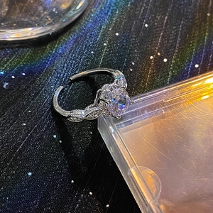 Adjustable sterling silver ring with large round zircon and woven pavé band details