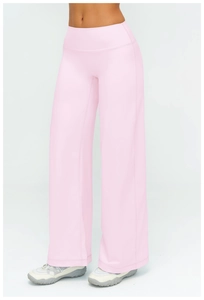 Detail view of high waist loose fitting pale pink yoga pants with elastic waistband