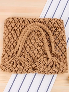 Natural khaki woven tote bag with hollow mesh design and stylish tassel details for beach