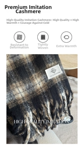 Detail of soft cashmere-like scarf showing check pattern and premium woven texture