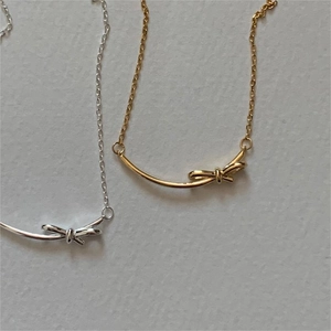 Minimalist 925 sterling silver bow knot necklace available in gold and silver finishes