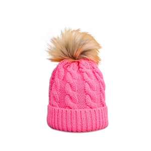 Detail of pink cable knit beanie featuring thick texture and a soft faux fur pom-pom