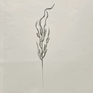 Detail of silver glitter branch pick for festive Christmas tree decoration and crafts