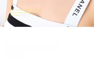 Detailed macro view of French style twisted knit strap with minimalist logo embroidery