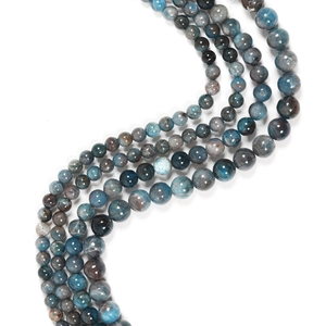 S-curve arrangement of natural blue kyanite round beads for DIY jewelry making