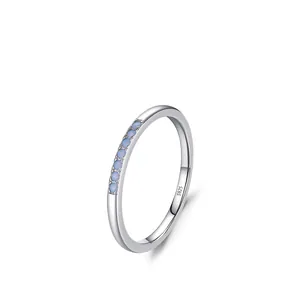 Minimalist S925 sterling silver ring featuring seven round light blue opal stones