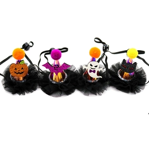 Detail of four Halloween pet hats with pumpkin, bat, and ghost motifs on mesh