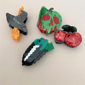 Creative Halloween hair claws set featuring witch hat and cherry designs in acetate