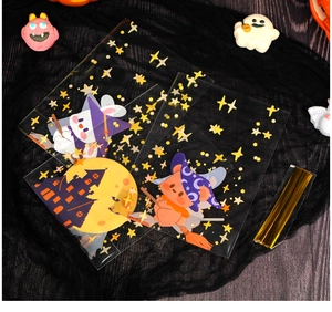 Detail view of transparent Halloween candy bags with colorful cartoon prints
