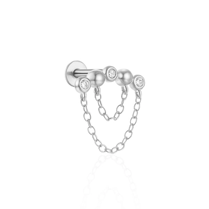 Macro detail of 925 sterling silver ear stud with CZ diamonds and elegant fringe chain