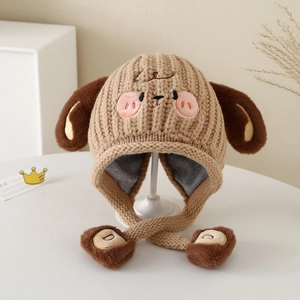 Detail of khaki knit puppy hat featuring plush brown ears and soft embroidery