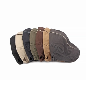 Classic cotton flat caps in seven assorted colors shown in a fan layout against white background