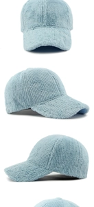 Detail of light blue plush baseball cap with warm striped faux fur texture for winter