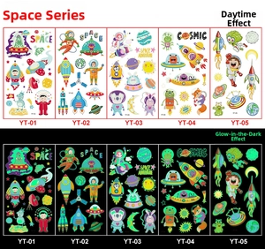 Luminous space theme kids tattoos featuring astronauts and rockets in day and night view
