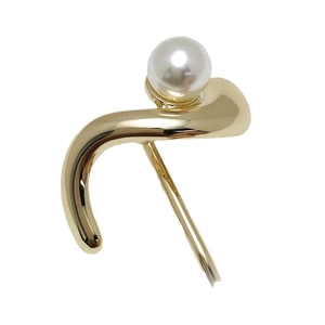 Elegant gold metal ponytail hook with large white pearl accent for minimalist hair styling