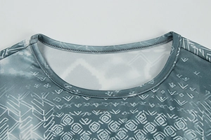 Detail of crew neckline with reinforced stitching and geometric tribal print pattern