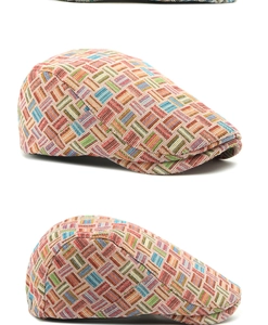 Detailed view of the multi-colored geometric jacquard weave texture on a retro flat cap