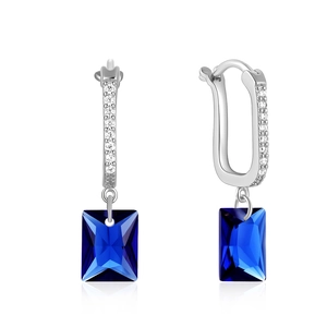 Detail of S925 silver U-shaped hoop earring with rectangular sapphire blue zircon stones