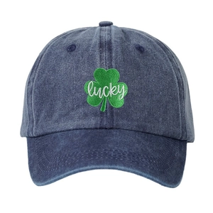 Washed navy denim baseball cap featuring lucky green clover embroidery for sun protection