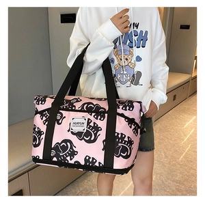 Pink travel bag with elephant print and expandable wet-dry separation storage compartment