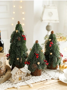Three-piece mini snow Christmas trees with red berries and pine cones on wood base