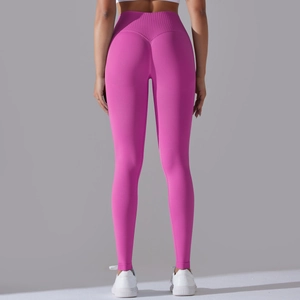 Detail of seamless ribbed high waisted yoga pants with V-shaped peach butt lifting design