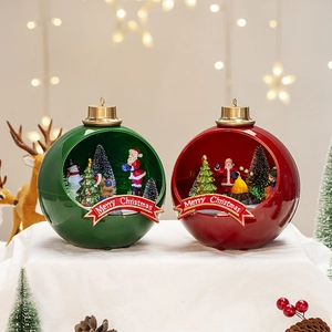 Detail of Christmas glowing house ornaments with Merry Christmas banner and festive bokeh