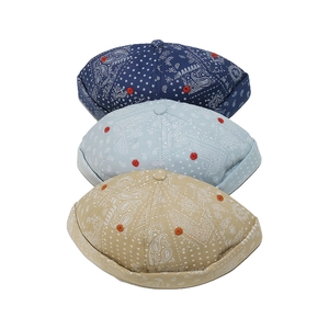 Three retro paisley docker hats in dark blue, light blue, and khaki on white background