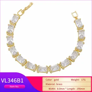 Hip hop style gold brass bracelet with oval cubic zirconia and baguette cut stones