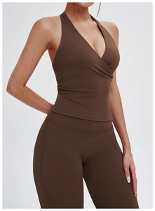 Detailed view of dark brown halter V-neck yoga top and matching high-waist leggings set