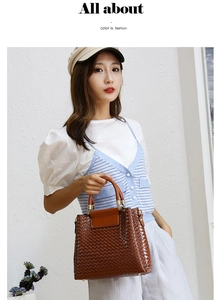 Fashionable brown woven texture tote bag held by model in stylish outfit