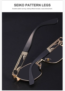 Macro detail of golden steampunk sunglasses legs with intricate seiko pattern engraving