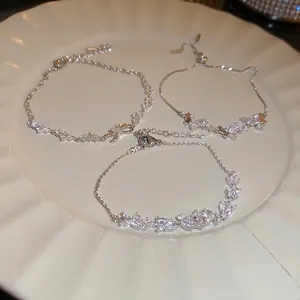 Elegant zircon flower and butterfly silver bracelet set with adjustable chain extension