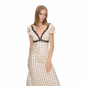 French vintage polka dot midi dress with black lace trim and puff sleeves in beige
