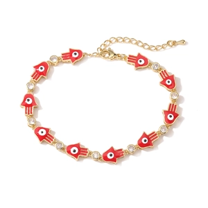 Golden Hamsa Hand bracelet with red enamel evil eye and white zircon detailing