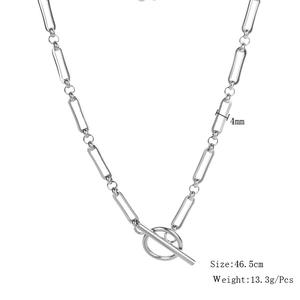 Macro detail of 4mm silver stainless steel cross chain with a secure toggle clasp