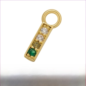 Macro shot of 4.5x13.5mm gold brass pendant with multi-color cubic zirconia inlay