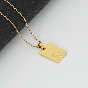 18K gold plated stainless steel rectangle pendant necklace with The World Is Yours engraving