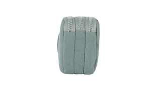 Close-up of a blue nylon phone pouch featuring three separate zippered compartments