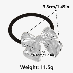 Detailed view of silver bow hair tie dimensions: 3.8cm height and 4.4cm width, weight 11.5g
