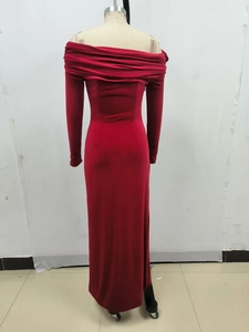 Detail of elegant red off-shoulder long-sleeved evening gown showcasing back seam and fit