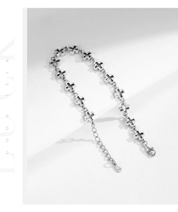 Detail of S925 sterling silver hollow cross bracelet with adjustable lobster clasp