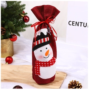 Detail of red burlap Christmas wine bag with cute snowman appliqué and satin drawstring