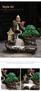 Macro shot of mountain landscape incense burner with flowing smoke waterfall detail